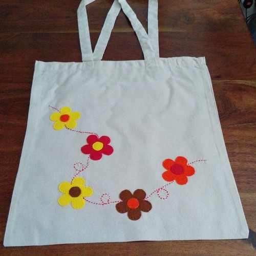 Hand appliqued floral - appliqued,
