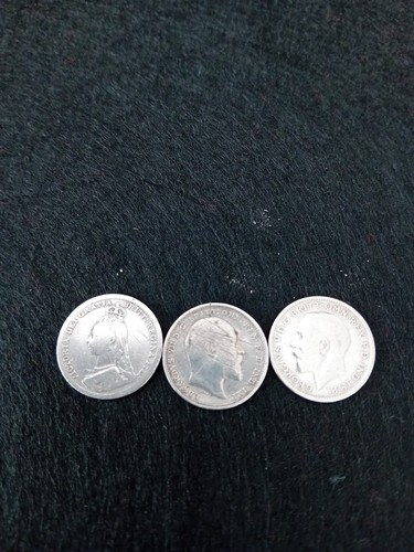 Three silver pence coins - silver,