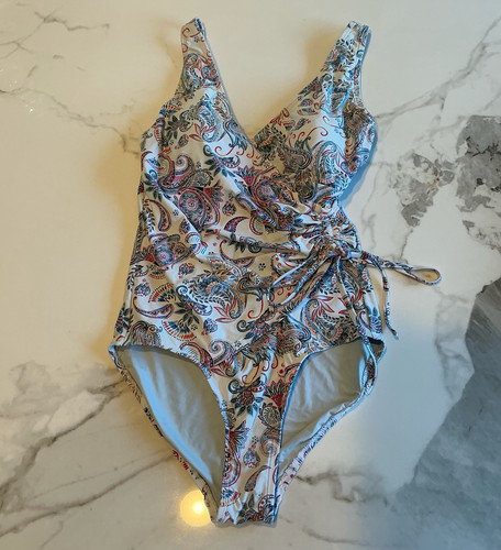 Nip tuck swim - tuck, one