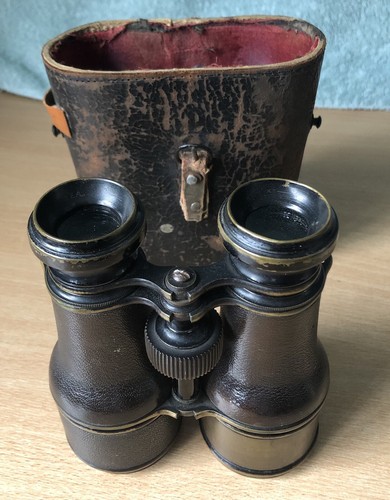 Old binoculars field glasses - binoculars,