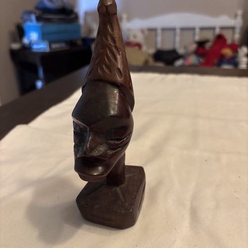 Hand carved african head - hand,