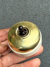 VINTAGE BRASS & PORCELAIN DOLLY LIGHT SWITCH