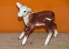 Beswick ceramic Hereford Calf Cow Mouth closed -9.5 cms brown & white gloss 901B