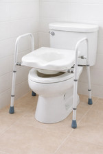 Raised toilet seat frame