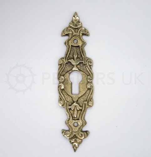Ornate brass escutcheon - ornate,