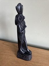 The statue is a representation of Horus, an ancient Egyptian god.