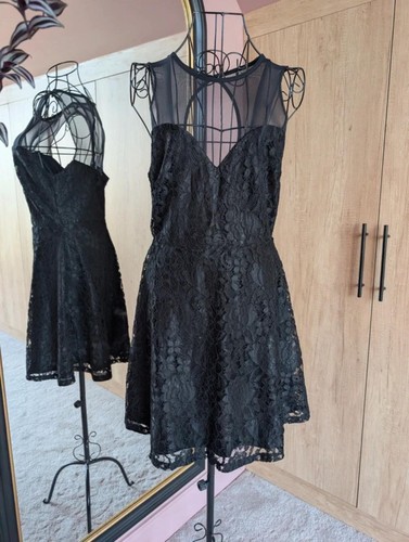 Black lipsy dress new without - black,