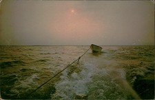 Postcard:  Towing a Dory behind a fishing boat Provincetown on Cape Cod.