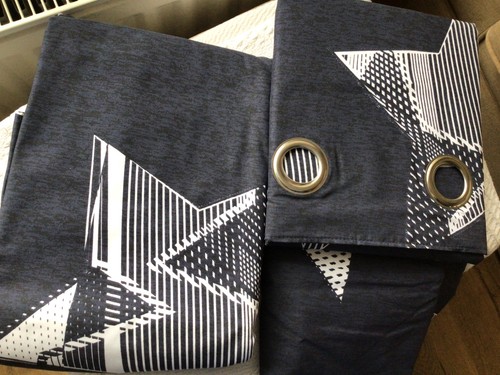 Pair curtains form next - of,