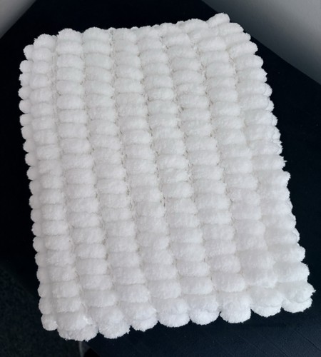 Hand knitted pom - pom, baby