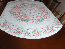 Large pink and white round tablecloth.  -  59 inch dia