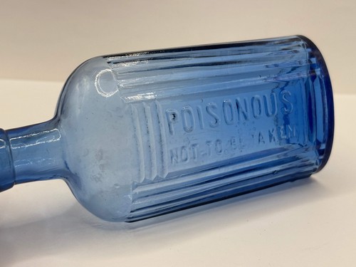 Old blue glass poison bottle - blue,