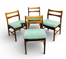 SET OF FOUR TEAK DINING CHAIRS