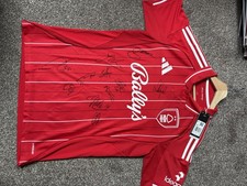 Signed / Autographed