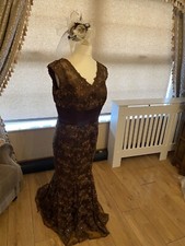 Esquisite Stacees Chocolate dress With Sequence Satin Waist Matching Fascinator