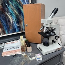 Meiji  Microscope with box slides and more 
