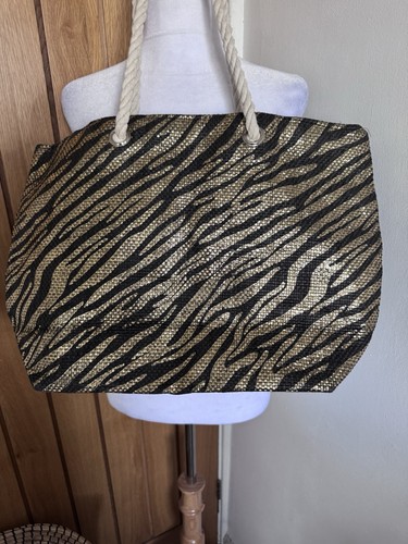 Gold black zebra print - &,