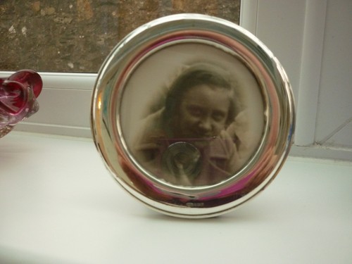 Solid silver circular photo - solid,