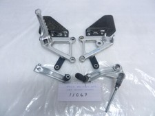 APRILIA RSV MILLIE 2003 L&R FOOTREST HANGERS & LEVERS  (11067)