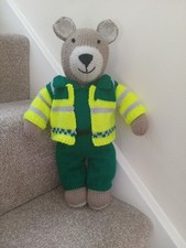 new hand knitted teddy bear in