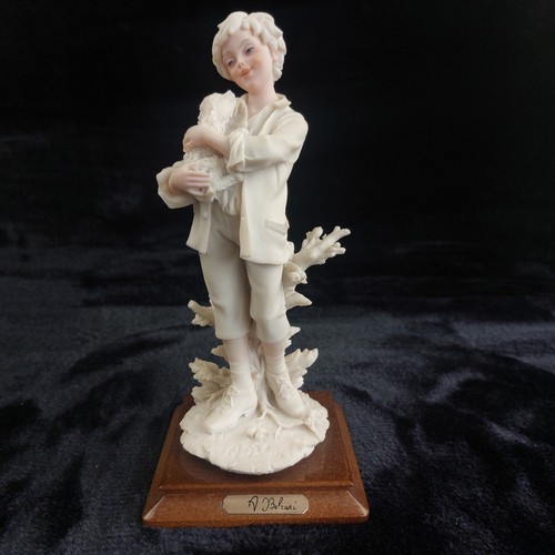 Belcari figurine boy with - v.,