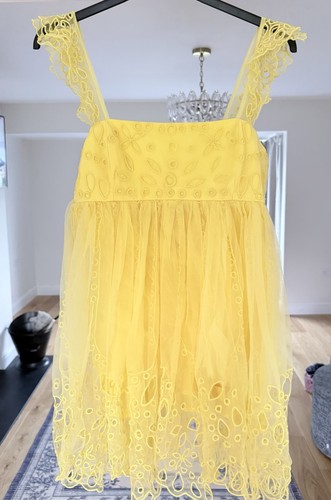 Anthropologie let yellow - let,