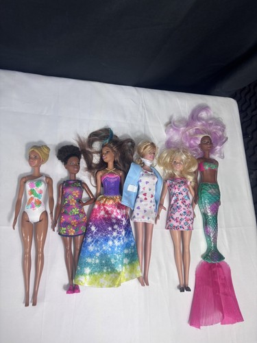 Genuine barbie dolls - x,