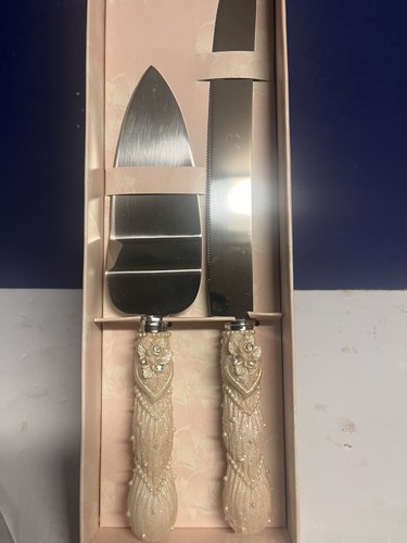 Wedding cake knife and - cake,