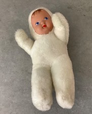 Nice doll, plastic face ,covered in fur Rushton Style