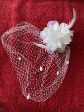 Large white flower with net, hair clip/fascinator