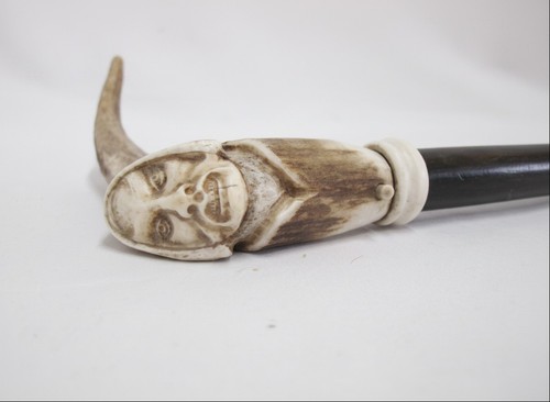 Carved deer antler grim - carved,