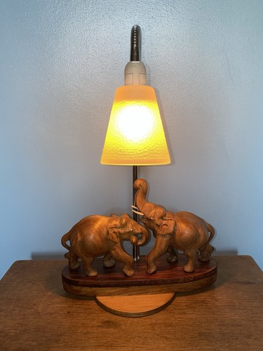 Pair wooden elephant - of, elephant’s