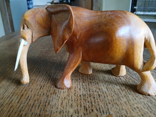 Hand carved wooden elephant - hand,