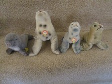Steiff - 3 vintage Robby Seals plus 1 other, with Steiff buttons
