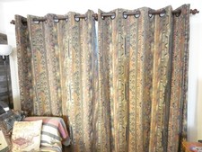 Heavy lined brown ethnic tribal pattern ring top curtains  