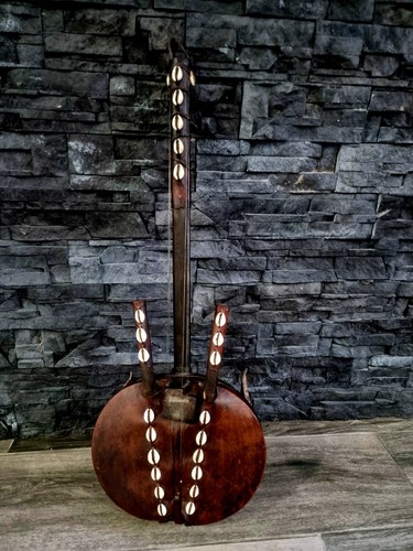 Vinted west african stringed - west,