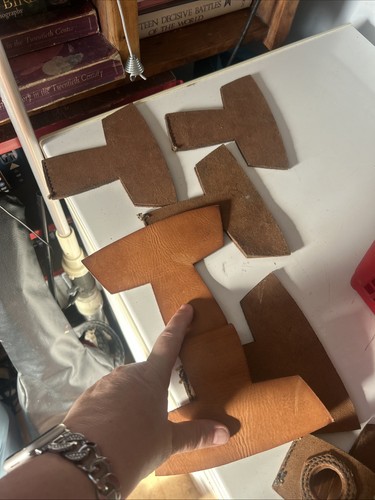 Cut leather pieces possibly - cut,