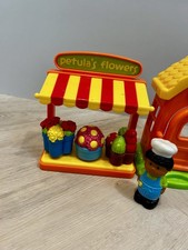 Happyland toy shop, flower stall and cupcake shop