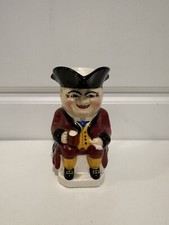 DEVONMOOR ENGLAND ART POTTERY TOBY JUG TRADITIONAL FIGURE MAROON JACKET