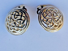 Silver clip on Celtic knot