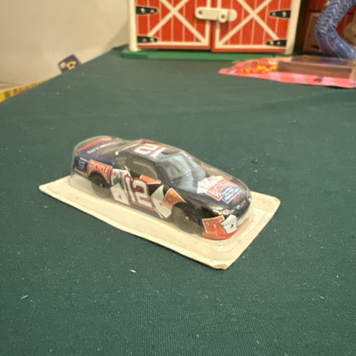 Die cast miniature race car - die,