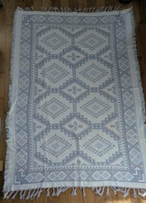 Hand Woven in India 100%