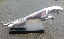 Large leaping jaguar car - jaguar,