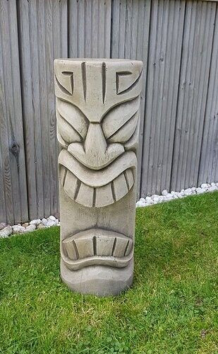 Stone totem pole statue