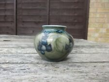 Moorcroft Pottery green on green leaves and berry vase .m55 shape