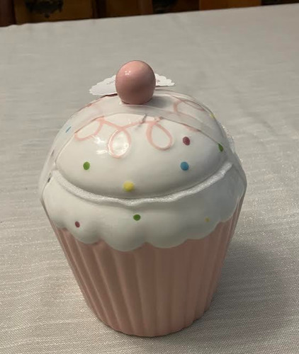 Pink and white cupcake - and,