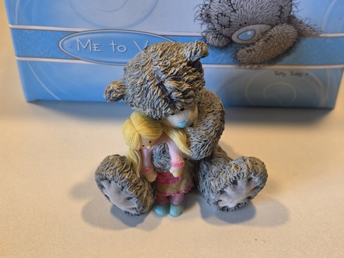 You bear figurine - to,