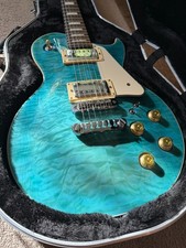 Aria Pro II PE-480 Electric Guitar in stunning See Thru Emerald Blue