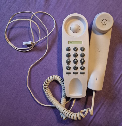 Touch tone slimline telephone - touch,