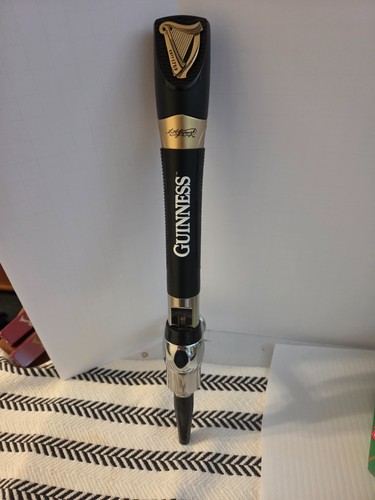 Guinness beer tap handle gold - beer,